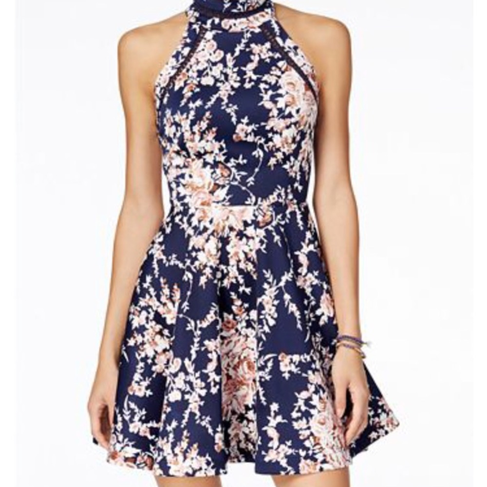 Junior navy blue formal dress with floral print.